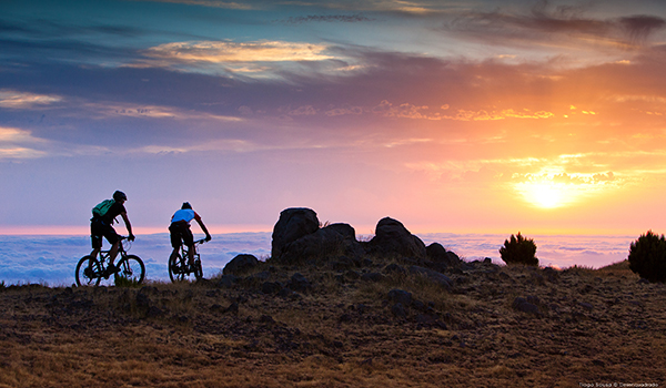 Mountain biking at sunset at Galo Resort